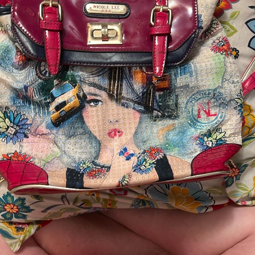 Nicole Lee Large backpack style purse.